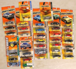 35 Matchbox assorted cars in unopened original packages