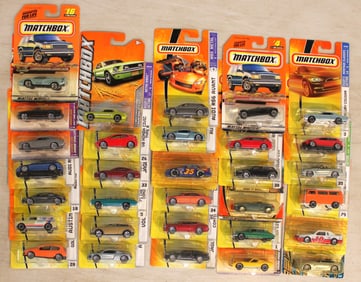 31 Matchbox assorted cars in unopened original packages
