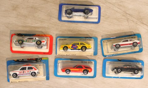 7 Vintage Hot Wheels cars  in unopened original packages