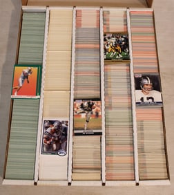 Large box of mixed football trading cards