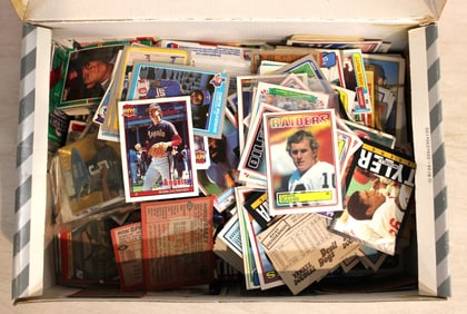 Box of mixed sports trading cards
