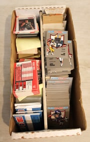 Box of mixed sports trading cards