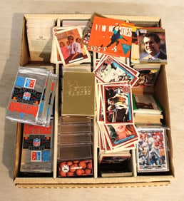 Box of mixed trading cards: sports, music, American Girl & others