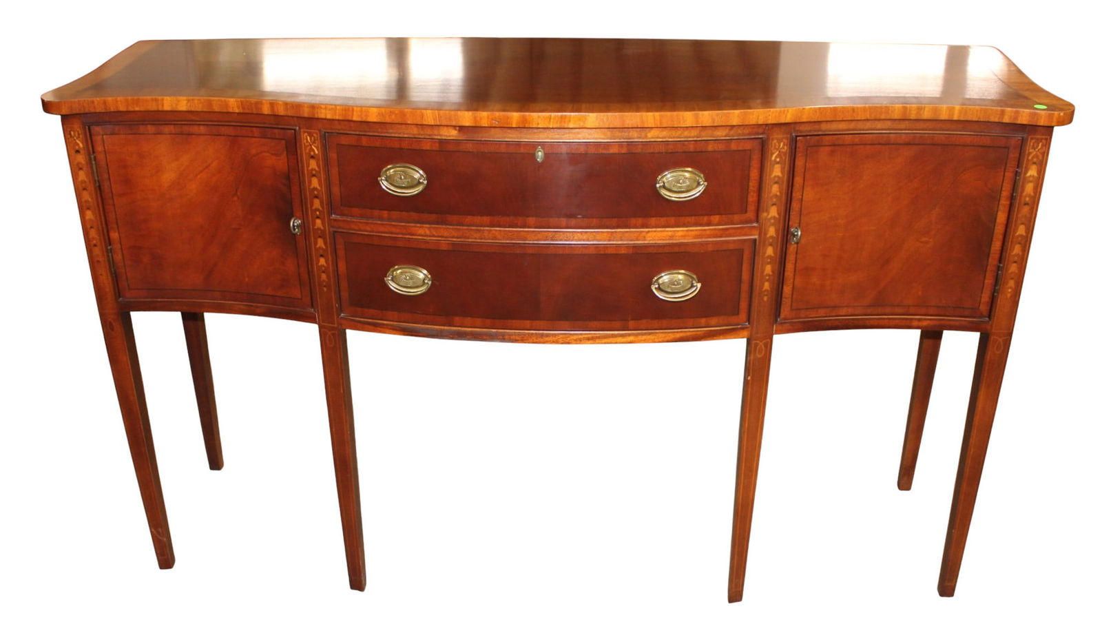 Ethan Allen banded and bell flower inlaid tapered leg buffet with original finish & key: Ethan Allen Furniture banded and bell flower inlaid tapered leg buffet with original finish and key, mahogany and other, dovetail construction, structurally sound and in good condition with slight wea