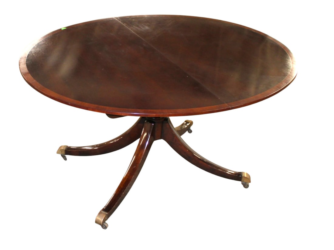 Baker oval mahogany banded pedestal dining room table, John Wanamaker: Baker Furniture quality oval mahogany banded pedestal dining room table with 3 original 14" leaves in their original box from John Wanamaker, original finish, structurally sound and in good condition