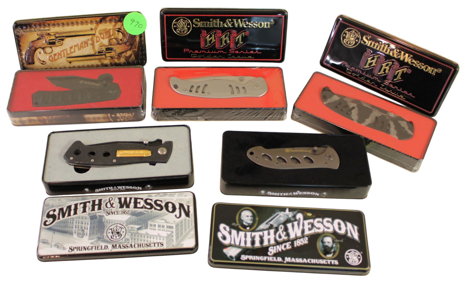 5 New S&W collector tins with knives, 3 factory sealed: 5 New Smith and Wesson collector tins with knives, 3 factory sealed, liner lock folder, premium 15-2, premium 15-4, clip point, serrated clip point