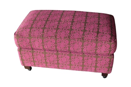 Sculpture upholstered ottoman on wheels