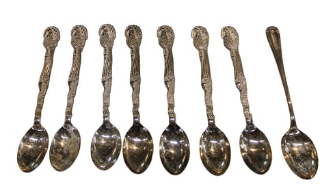 7 large silverplate serving spoons. Approx. 13" length