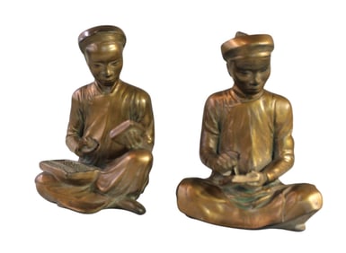 Pair of vintage chinese monk bookends in a bronze finish. 8.5"h