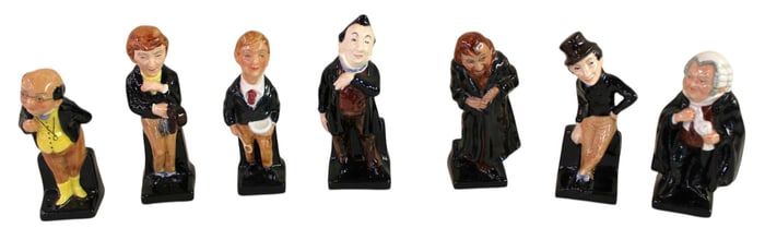 7 Royal Doulton porcelain figurines: Fagin, Oliver Twist, David Copperfield, Jingle, Pecksniff,