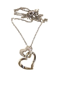 Beautiful diamond and sterling double heart pendant necklace