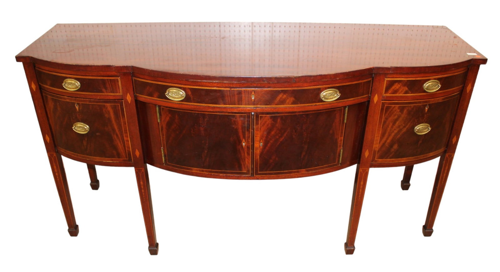 Kindel burl mahogany and inlaid 5 drawer 2 door sideboard: Kindel burl mahogany and inlaid 5 drawer 2 door sideboard. Structurally sound and in good condition but has some slight surface wear on top. 38"h x 74"l x 26.5"d