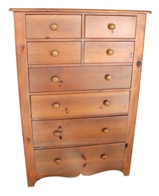 Sg. James Becker dated 1996 knotty pine 8 drawer high chest