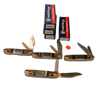 4 Smith & Wesson etched pocket knives: praying cowboy, mason, scorpion, bronco rider, 3 CH297,