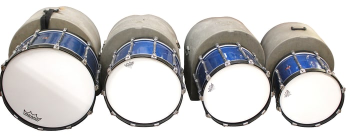 4 Premier blue sparkle bass drum line drums with hard case. Some has scratches. 26x16.5 20x16.5