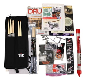 Large drum gift box with drum keys, parts, accessories, sticks, towels, wax, wire brushes, magazines