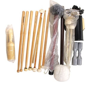 Box of Sabian mallets, drum sticks, musical shakers and other