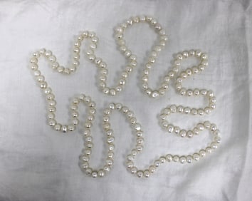 64" endless cultured freshwater pearls 9.5-10.5mm