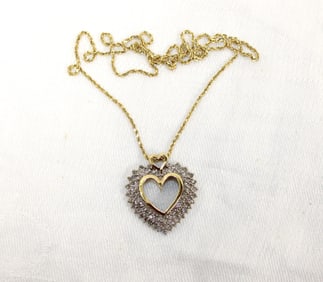 Beautiful 2 ctw. natural diamond heart necklace. 14k gold chain 4.04g. 10k gold heart 5.0g