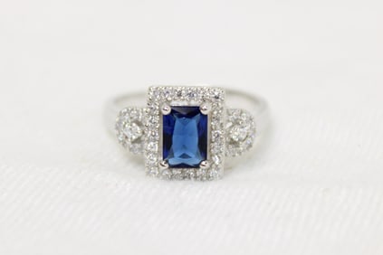 3 ctw. blue sapphire and topaz emerald cut ring in sterling silver, size 7