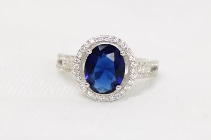 3 ctw. blue sapphire and white topaz oval ring in sterling silver, size 7