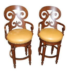 Nice pair of Frontgate leather swivel mahogany finish frame stools, like new condition