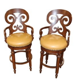 Nice pair of Frontgate leather swivel mahogany finish frame stools, like new condition