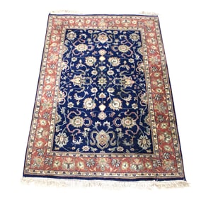 Hand stitched rug 71"l x 47"w