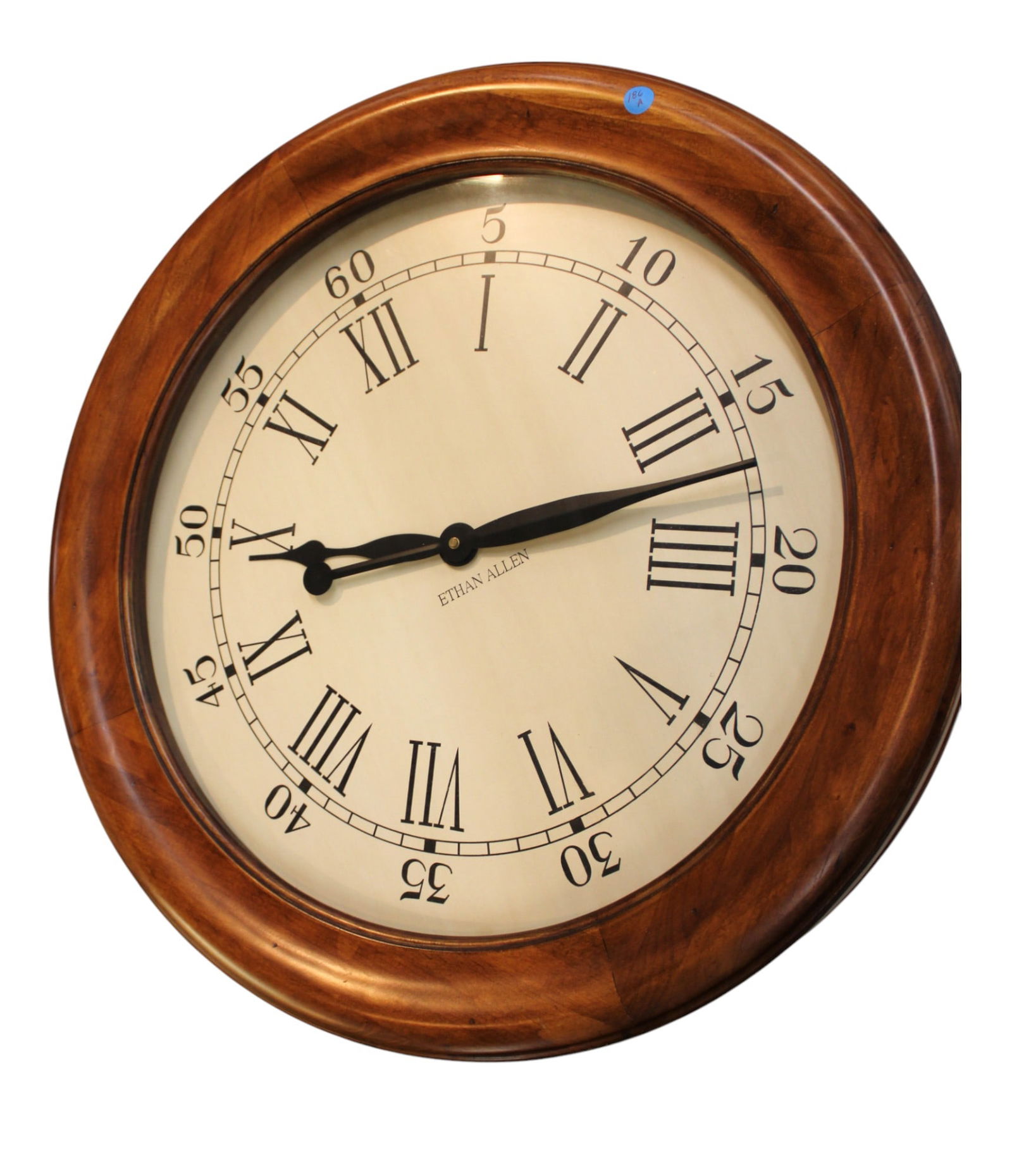 Ethan Allen mahogany case 25" diameter quartz wall clock: Ethan Allen mahogany case 25" diameter quartz wall clock, structurally sound and in good condition. 25" diameter x 4"d