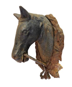 Cast iron horse head hitch, shows age. 11"h x 8"w x 6"d