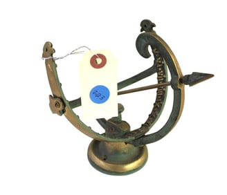 Brass sun dial.  7"h x 6" diameter