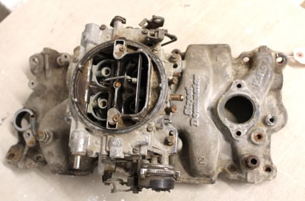 Small block Chevy Holly Street Dominator aluminum intake manifold with a Edelbrock carburetor