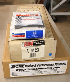 Muffler, transmission pan, carburetor adapter plate, transmission filter