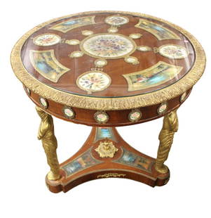 French Style Bronze Mounted Figural Center Table: Elaborate french style bronze mounted figural center table, burl mahogany, hand painted porcelain medallions and scenes, glass top is good on 3 bronze figural base, structurally sound, original finish