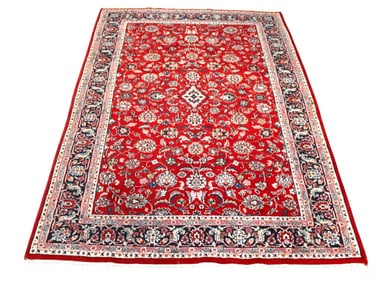 Hand stitched 70" x 110" rug, good condition