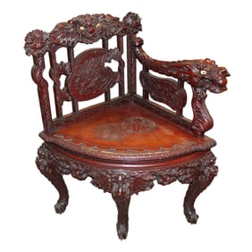 Antique highly carved Chinese dragon corner chair