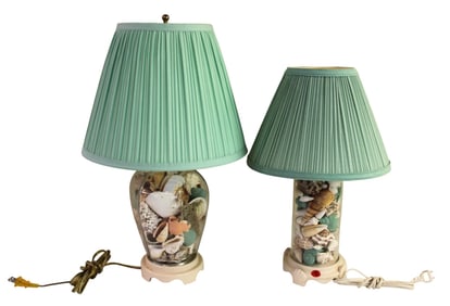 2 clear glass lamps filled with sea shells