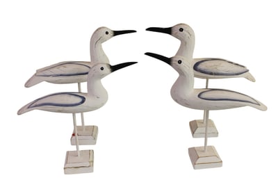 4 wooden water birds on stands. 14"h x 13"l x 3.5"w
