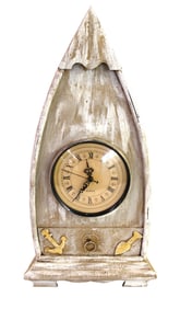 Boat shaped quartz clock. 19"h x 9.5"w x 6"d