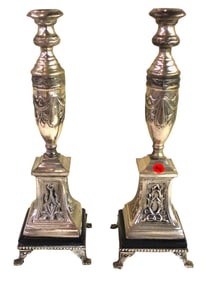 Pair of silverplate ornate paw foot candle sticks 17"h