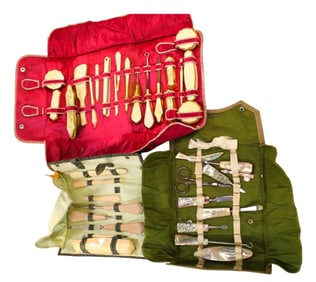 Dresser sets: 2 Bakelite and 1 Mother of Pearl