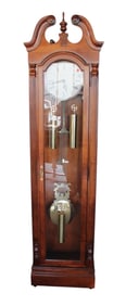 Howard Miller cherry case grandfather clock, model 610-826