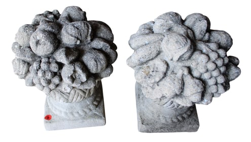 Pair of cast stone decorative flowers in basket
