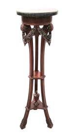 Solid mahogany marble top and carved pedestal