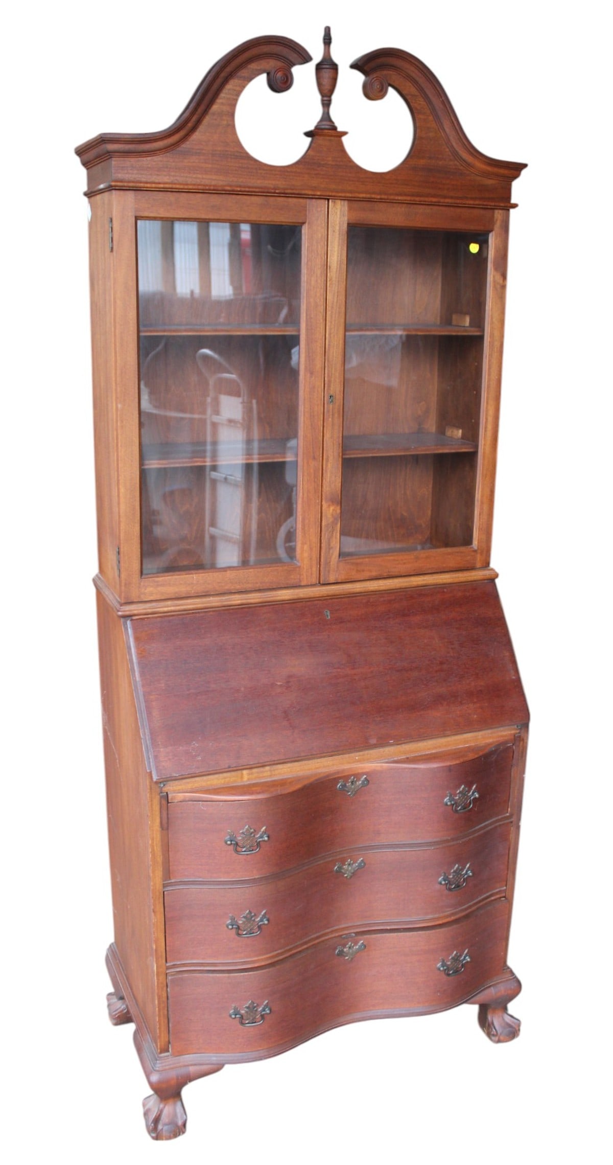 Vtg serpentine mahog. secretary bookcase: Vintage serpentine front mahogany secretary bookcase with ball & claw feet, removeable finial, structurally sound, original finish. 79"h x 30.5"w x 16.5"d