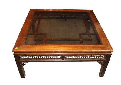 Mahogany framed glass top coffee table