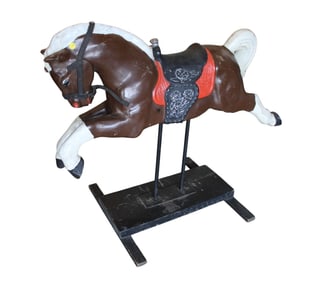 Antique child's merry-go-round horse on stand