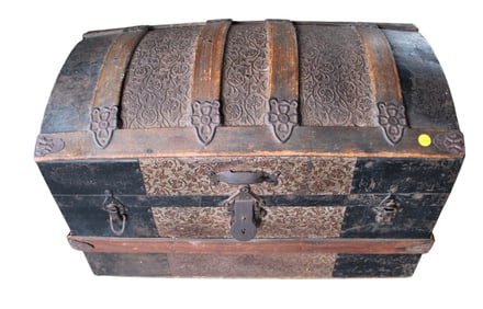 Antique oak strap hump back trunk with tole