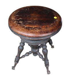 Antique ball and claw piano stool