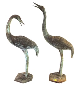 Pair of bronze herons
